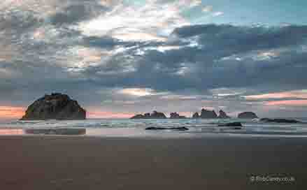 <p>Face Rock. Resembling a human face in profile. As though a stone giant is bathing in the sea</p>