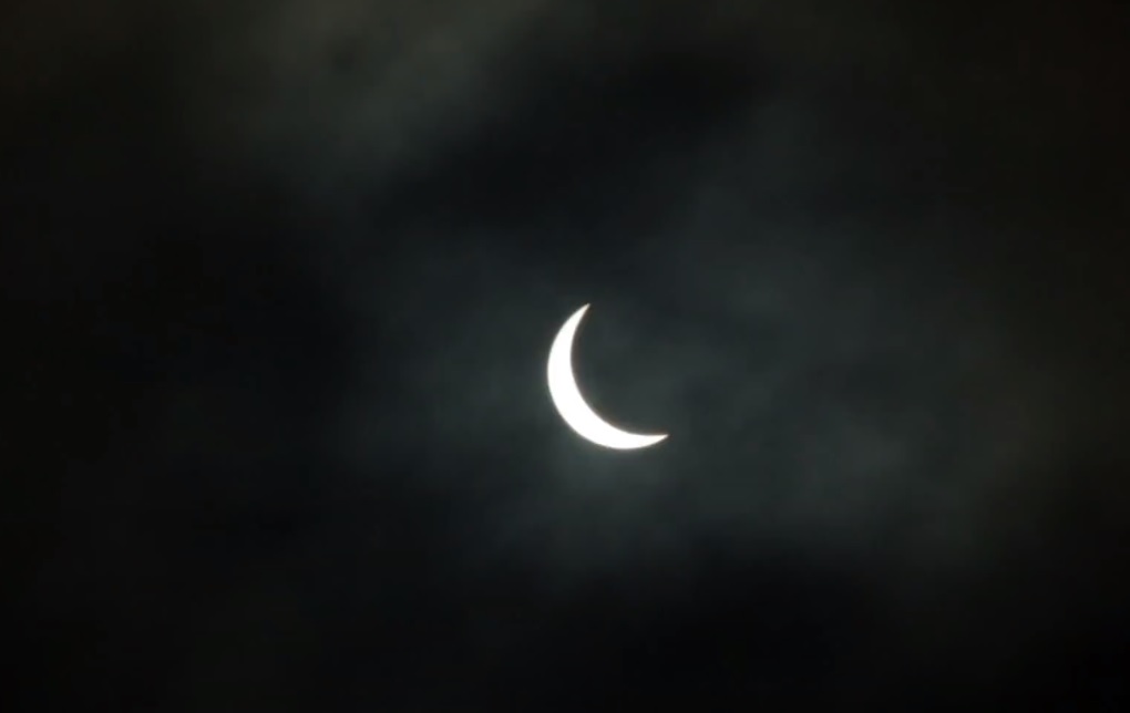 <p>There was a near complete eclipse over Edinburgh so I decided to try my hand at filming it. I was not prepared for how fast the sun moved across the sky. Nor was I prepared for the chaning cloud cover. </p>